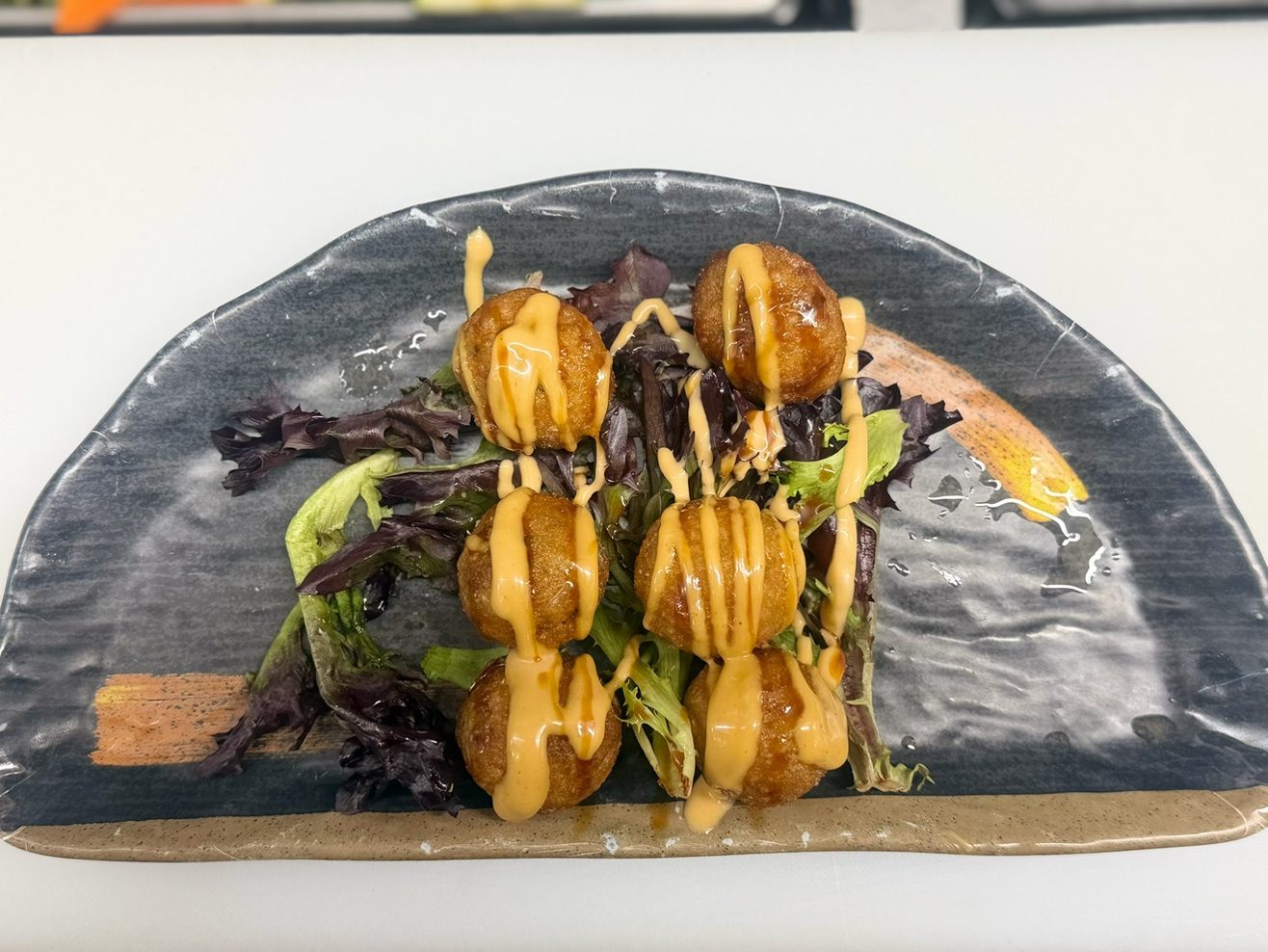 8. Takoyaki (6pc).